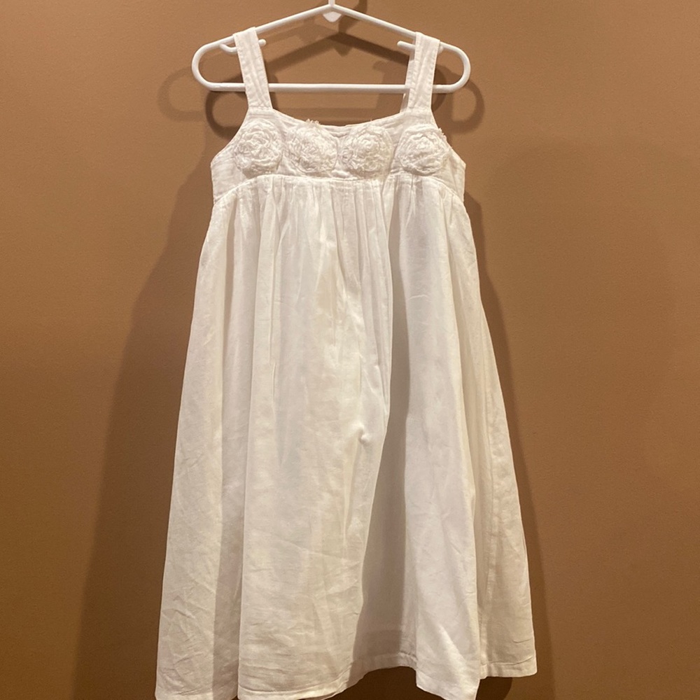 Mini Boden white dress with rosettes.  Girls size 7/8